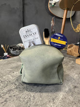 Φόρτωση εικόνας στο εργαλείο προβολής Συλλογής, Green cloth on a gray surface with grooming products in the background